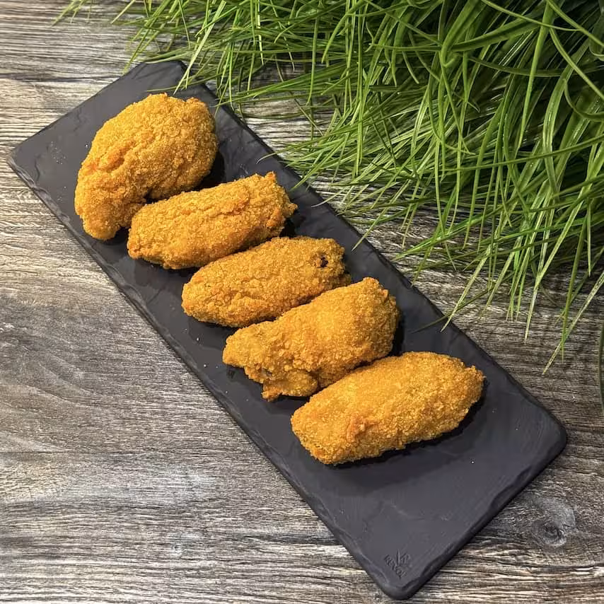 Фото Куриные крылышки в сухарях жареные во фритюре